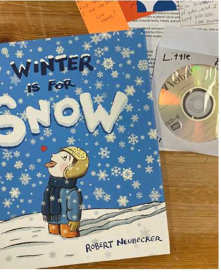 Photo of the cover of the book "Winter is for snow" and a DVD in a sleeve labeled "Little Readers."